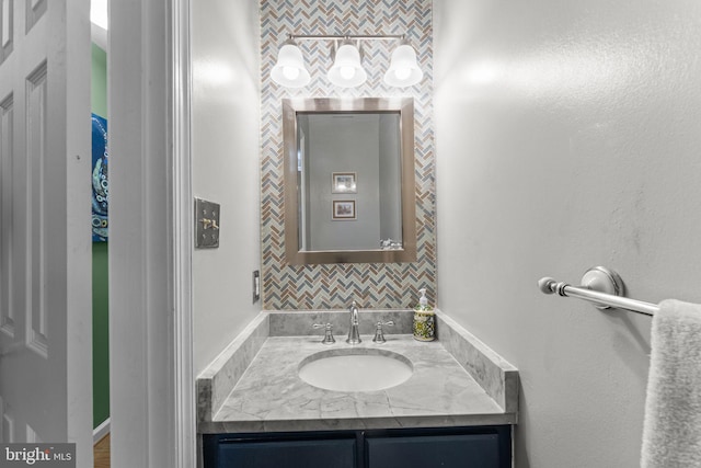 10034 Park Woods Ln, Burke, VA 22015 - bathroom featuring vanity and decorative backsplash