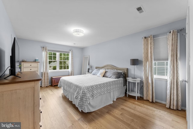 10034 Park Woods Ln, Burke, VA 22015 - bedroom with light wood finished floors