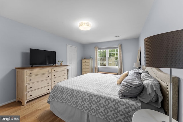 10034 Park Woods Ln, Burke, VA 22015 - bedroom featuring light wood finished floors and baseboards