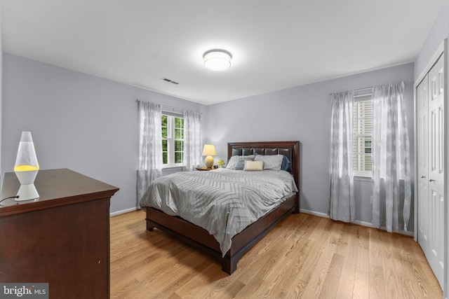 10034 Park Woods Ln, Burke, VA 22015 - bedroom featuring wood finished floors and a closet