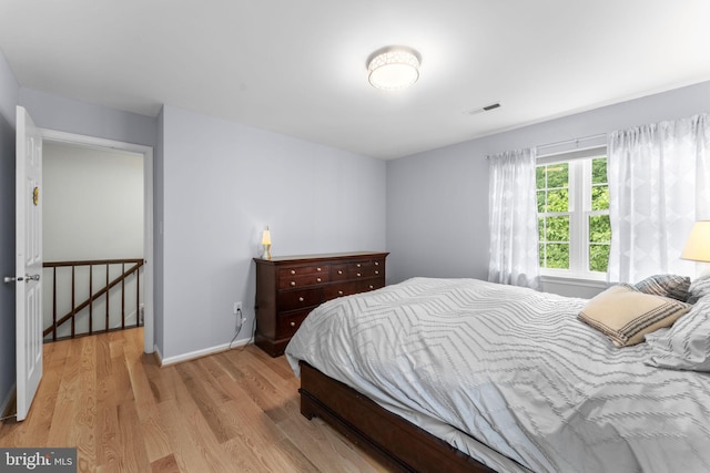 10034 Park Woods Ln, Burke, VA 22015 - bedroom featuring light wood-type flooring and baseboards