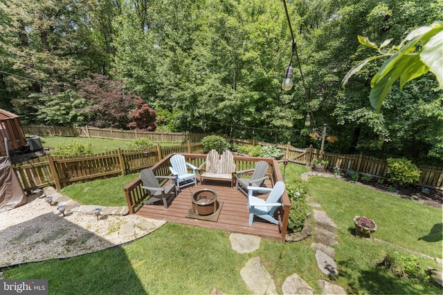 10034 Park Woods Ln, Burke, VA 22015 - fenced backyard with a wooden deck and a fire pit