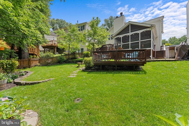 10034 Park Woods Ln, Burke, VA 22015 - rear view of property with a sunroom, a wooden deck, and a chimney