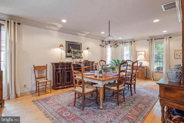 4 Surrey Rd, Rehoboth Beach, DE 19971 - dining area featuring crown molding, a chandelier, light wood-style floors, and recessed lighting