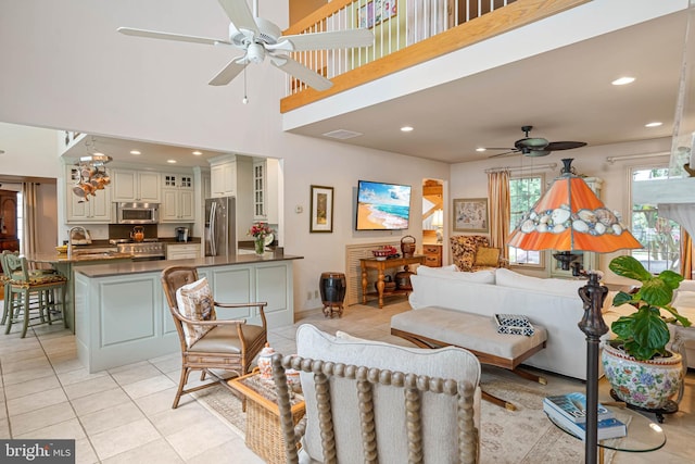 4 Surrey Rd, Rehoboth Beach, DE 19971 - living area featuring ceiling fan, light tile patterned floors, a high ceiling, and recessed lighting