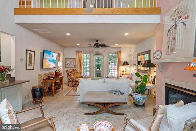 4 Surrey Rd, Rehoboth Beach, DE 19971 - living area with a ceiling fan, recessed lighting, light tile patterned flooring, and a glass covered fireplace