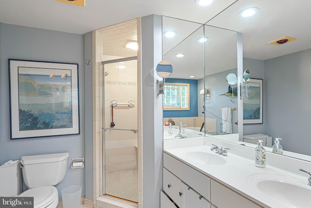 4 Surrey Rd, Rehoboth Beach, DE 19971 - full bathroom featuring double vanity, a stall shower, and recessed lighting