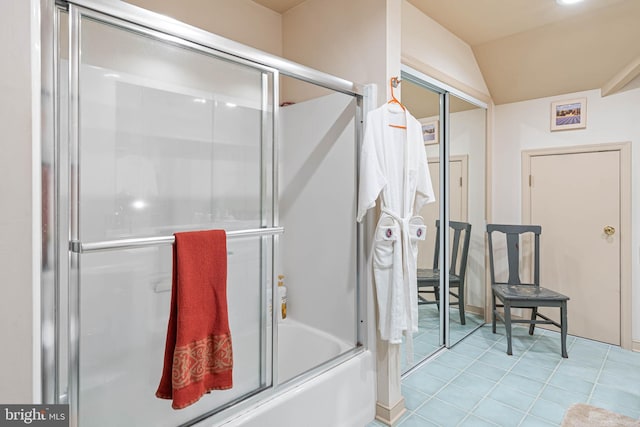 4 Surrey Rd, Rehoboth Beach, DE 19971 - bathroom featuring bath / shower combo with glass door, vaulted ceiling, and tile patterned flooring
