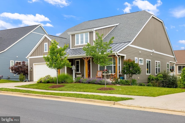 125 Towhee Dr, Lake Frederick, VA 22630 - view of front of home featuring a standing seam roof, covered porch, a shingled roof, and a front lawn