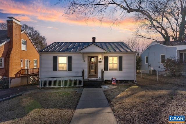 2504 Plateau Rd, Charlottesville, VA 22903 - bungalow featuring a standing seam roof, a metal roof, and a chimney