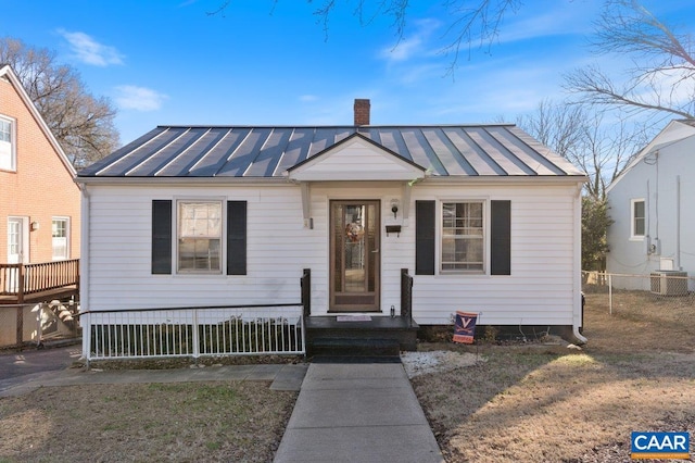 2504 Plateau Rd, Charlottesville, VA 22903 - bungalow featuring a standing seam roof, a chimney, and a metal roof