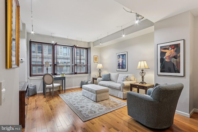 1425 Locust St Unit 7D, Philadelphia, PA 19102 - living area with track lighting, hardwood / wood-style flooring, and a desk