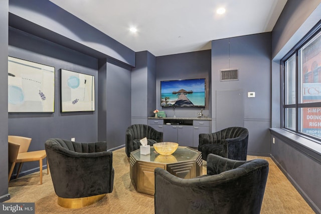 1425 Locust St Unit 7D, Philadelphia, PA 19102 - home theater room featuring light carpet and baseboards
