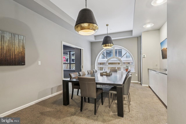 1425 Locust St Unit 7D, Philadelphia, PA 19102 - dining area featuring a tray ceiling and light carpet