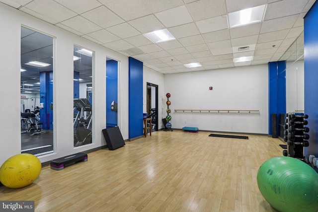 1425 Locust St Unit 7D, Philadelphia, PA 19102 - workout area with wood finished floors and a paneled ceiling