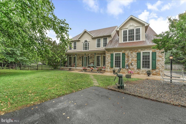 117 Woodrow Ln, Port Deposit, MD 21904 - view of front of home with stone siding, a patio, and a shingled roof