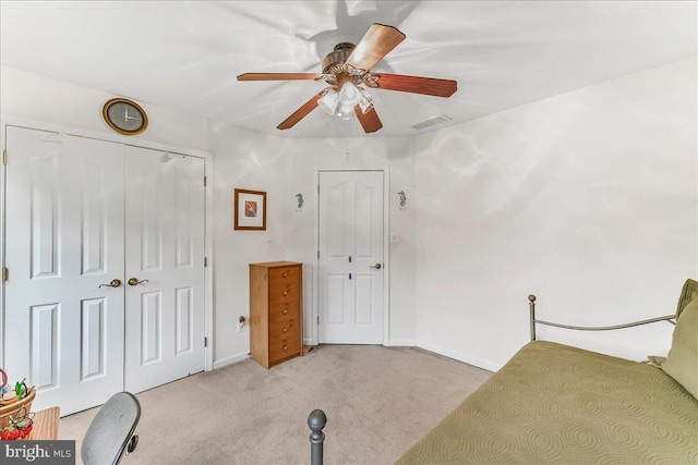 117 Woodrow Ln, Port Deposit, MD 21904 - unfurnished bedroom with light colored carpet, a closet, and a ceiling fan