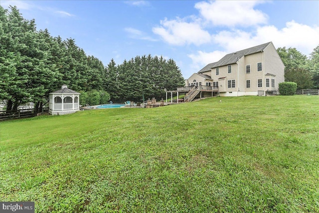 117 Woodrow Ln, Port Deposit, MD 21904 - view of yard featuring a wooden deck, an outdoor pool, and stairway