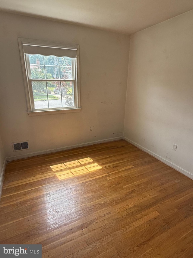 7400 Roxbury Ave, Manassas, VA 20109 - unfurnished room with wood finished floors and baseboards