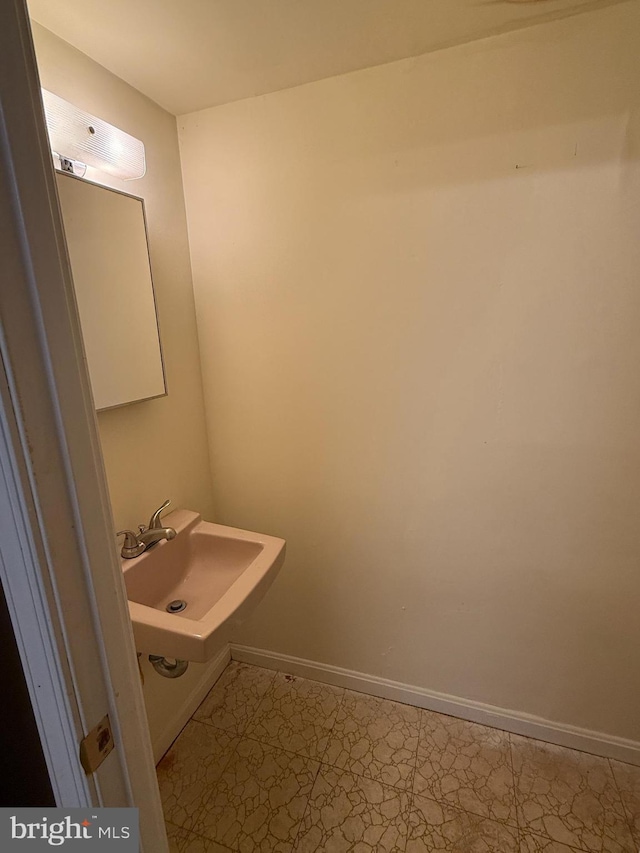 7400 Roxbury Ave, Manassas, VA 20109 - bathroom with tile patterned floors and a sink