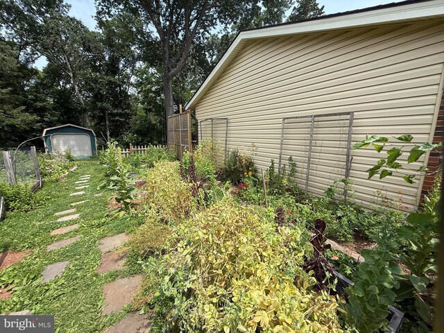7400 Roxbury Ave, Manassas, VA 20109 - view of yard featuring a storage unit