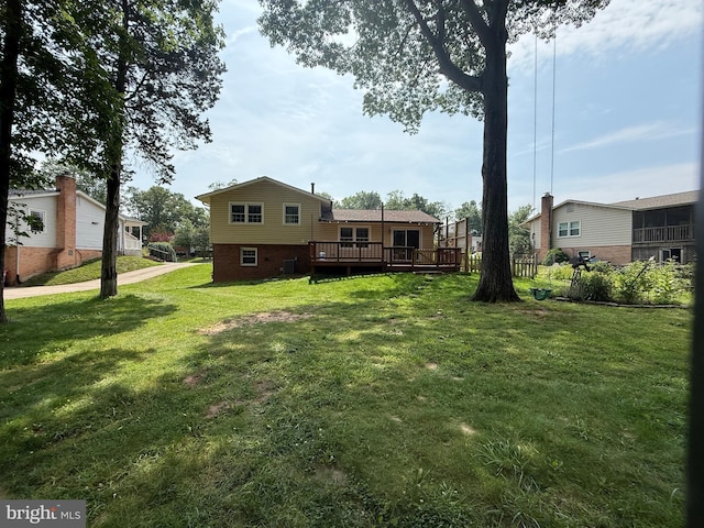 7400 Roxbury Ave, Manassas, VA 20109 - rear view of property with a wooden deck and a yard