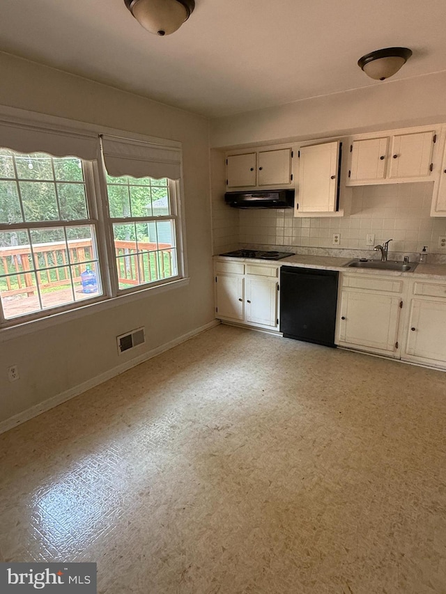 7400 Roxbury Ave, Manassas, VA 20109 - kitchen with black appliances, extractor fan, white cabinets, and tasteful backsplash