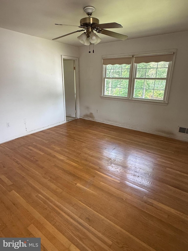 7400 Roxbury Ave, Manassas, VA 20109 - empty room with wood finished floors and ceiling fan