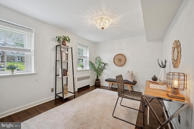 12 Rodney Rd, Bryn Mawr, PA 19010 - office with radiator heating unit, wood finished floors, and a chandelier