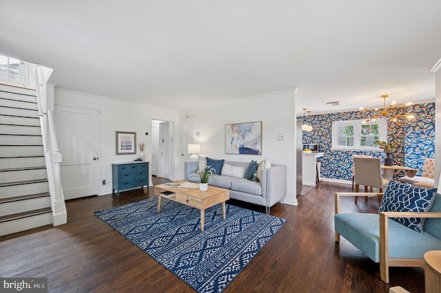12 Rodney Rd, Bryn Mawr, PA 19010 - living area with wallpapered walls, stairway, a chandelier, wood finished floors, and crown molding