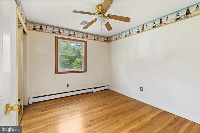 26140 High Banks Dr, Salisbury, MD 21801 - empty room with baseboard heating, light wood finished floors, and ceiling fan