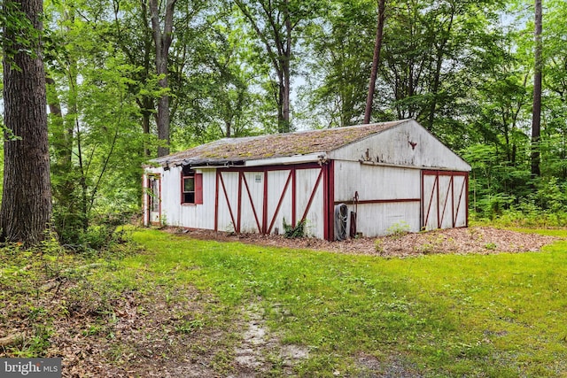 26140 High Banks Dr, Salisbury, MD 21801 - view of pole building featuring a yard