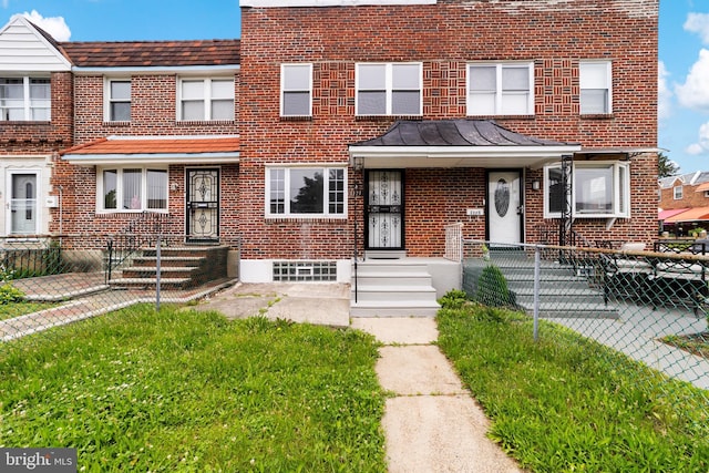1171 E Sharpnack St, Philadelphia, PA 19150 - townhome / multi-family property featuring brick siding