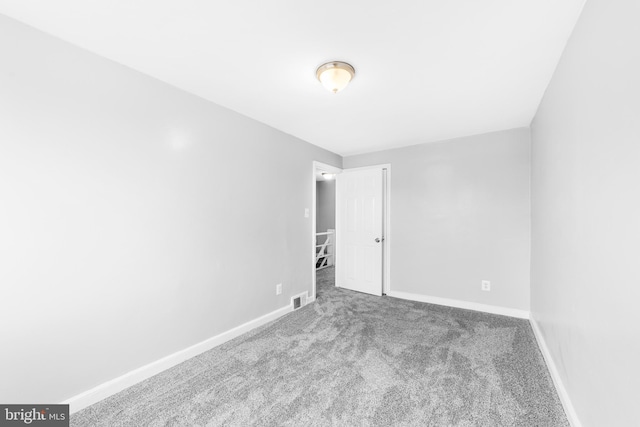 1171 E Sharpnack St, Philadelphia, PA 19150 - spare room featuring carpet floors and baseboards