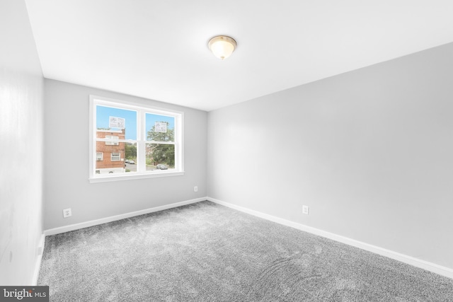 1171 E Sharpnack St, Philadelphia, PA 19150 - carpeted empty room featuring baseboards