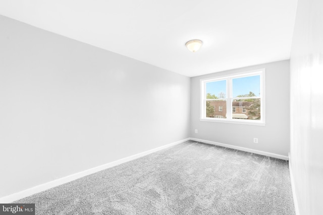 1171 E Sharpnack St, Philadelphia, PA 19150 - carpeted empty room with baseboards