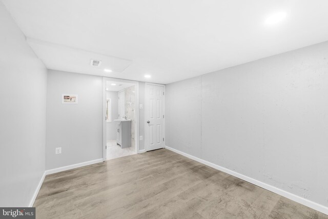 1171 E Sharpnack St, Philadelphia, PA 19150 - unfurnished bedroom with wood finished floors, recessed lighting, and connected bathroom