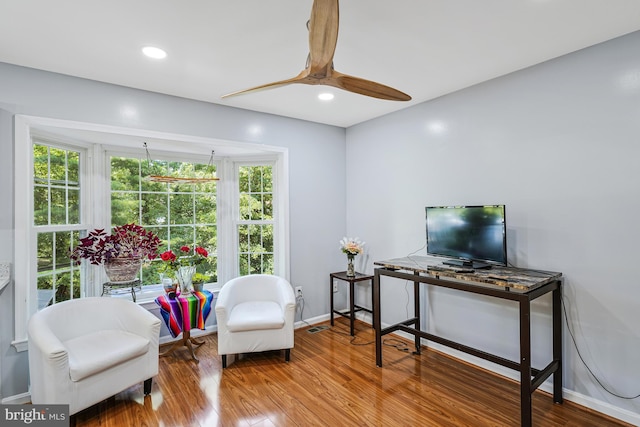 9126 Fisteris Ct, Springfield, VA 22152 - living area with wood finished floors, ceiling fan, and recessed lighting