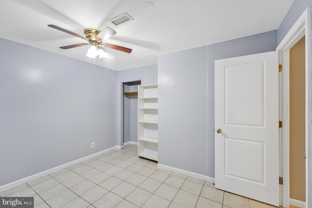 9126 Fisteris Ct, Springfield, VA 22152 - unfurnished bedroom featuring light tile patterned floors, ceiling fan, and a closet