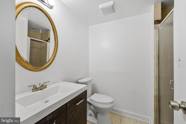 9126 Fisteris Ct, Springfield, VA 22152 - bathroom with tile patterned flooring, vanity, and an enclosed shower