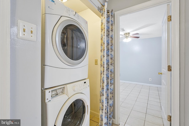 9126 Fisteris Ct, Springfield, VA 22152 - washroom featuring stacked washer / drying machine, light tile patterned flooring, and a ceiling fan