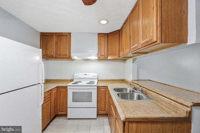 9126 Fisteris Ct, Springfield, VA 22152 - kitchen with white appliances, brown cabinetry, light countertops, light tile patterned floors, and recessed lighting