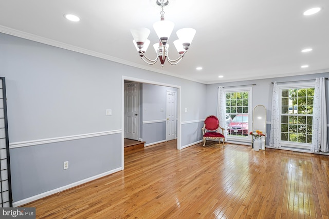 9126 Fisteris Ct, Springfield, VA 22152 - sitting room featuring crown molding, light wood finished floors, a chandelier, and recessed lighting