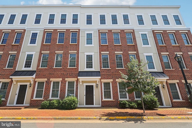 269 High Rail Ter SE, Leesburg, VA 20175 - multi unit property with brick siding, a standing seam roof, and a metal roof