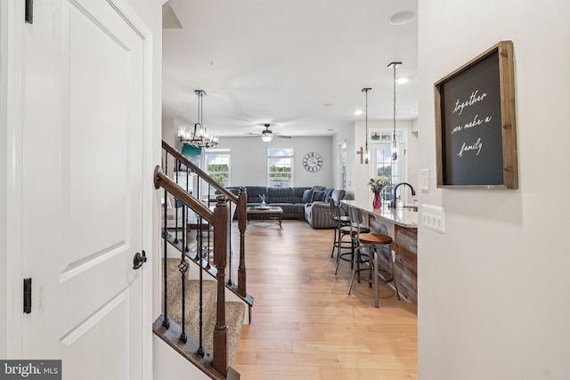 269 High Rail Ter SE, Leesburg, VA 20175 - interior space with light wood finished floors, stairway, a chandelier, and recessed lighting