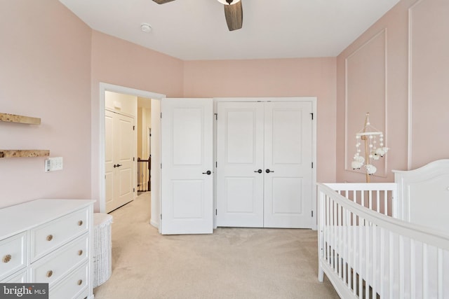 269 High Rail Ter SE, Leesburg, VA 20175 - bedroom featuring light carpet, a closet, and a ceiling fan