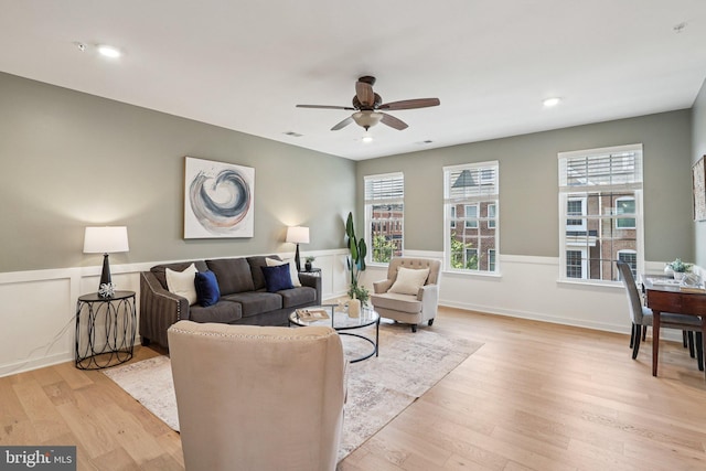 269 High Rail Ter SE, Leesburg, VA 20175 - living room with a ceiling fan, light wood-type flooring, healthy amount of natural light, a wainscoted wall, and recessed lighting