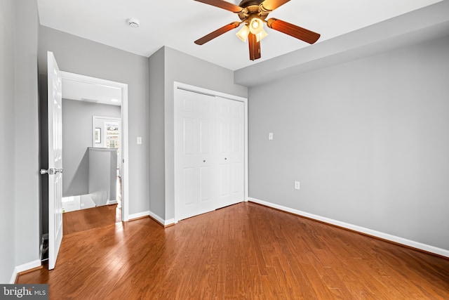 503 E Fort Ave, Baltimore, MD 21230 - unfurnished bedroom featuring wood finished floors, a closet, and ceiling fan