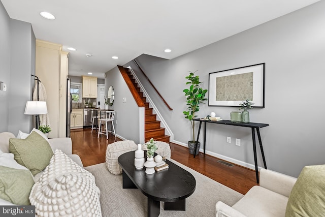 503 E Fort Ave, Baltimore, MD 21230 - living room featuring dark wood finished floors, stairway, and recessed lighting