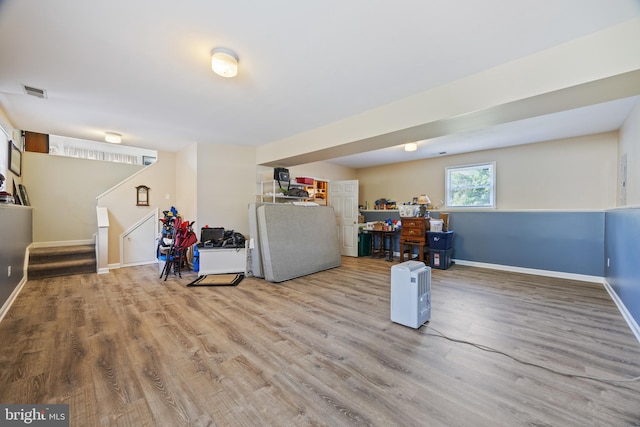 3341 Howellsville Rd, Front Royal, VA 22630 - basement featuring wood finished floors, stairway, and fridge
